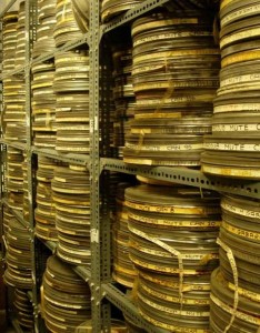 Rack shelving with piles of film canisters