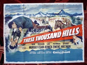 A poster for These Thousand Hills