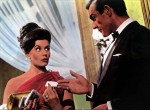 A lobby card for Dr. No, featuring Bond and Sylvia Trench