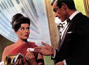 From a lobby card for Dr. No, featuring Bond and Sylvia Trench