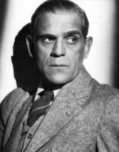 publicity image of Boris Karloff in tweed suit