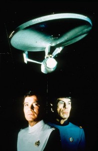 Kirk and Spock against a background of the Starship Enterprise