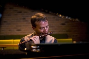 Stephen Horne playing piano and flute