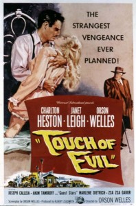 Lurid poster for Touch of Evil showing couple in clinch, with an older man looking-on