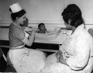 Mother, child and nurse at the South London Hospital, Clapham common south side, 1968